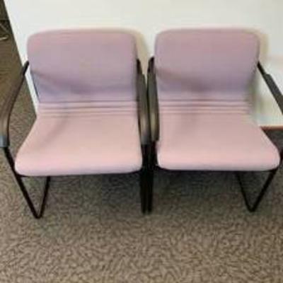 Set of purple cloth office chairs