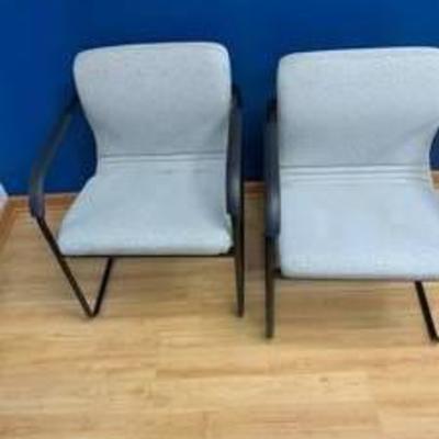 Set of light gray office chairs