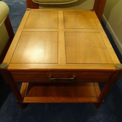 Heritage.. walnut colored end table mid century. Not a good photo with the lighting..... but this is a nice looking table. A round coffee...