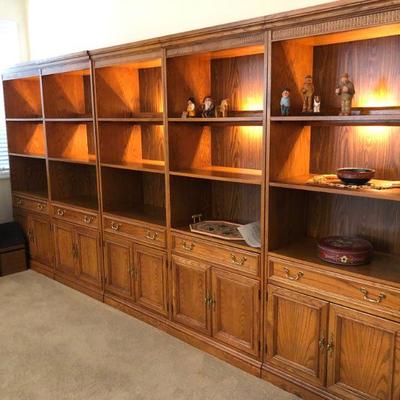 Selling  separately you can buy one or all. Nice condition lighted bookcases