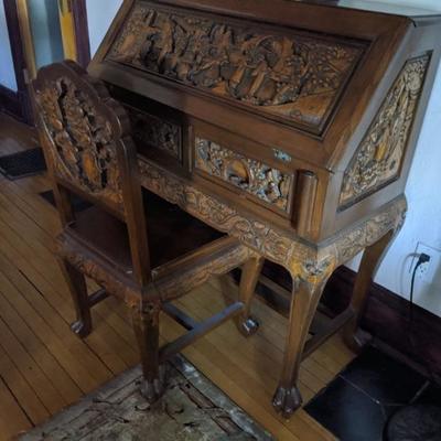 ornately carved (dragons, temples, musicians) Asian style secretary with matching chair/clawfeet 36