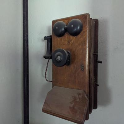 Antique wood crank phone wall mounted
14
