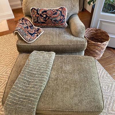 This chair and ottoman were custom made & upholstered with fabric that is over $100.00/yard.   They are in excellent condition!