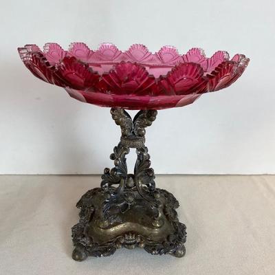 Cut Cranberry Crystal Pedestal Centerpiece on Silver Base.  Opening at 50% off at 8 am on Saturday.  Please read all Terms & Conditions...