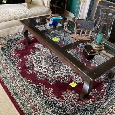 Nice machine made rug and coffee table.