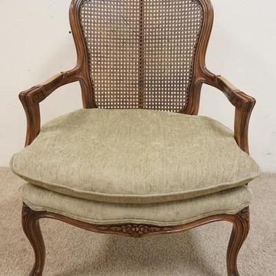 1065	FRENCH PROVINCIAL CARVED ARMCHAIR W/CANE BACK
