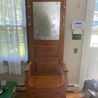 Beautiful coat rack with storage and mirror.  In excellent condition, like new.  Mirror is fogged for the picture.