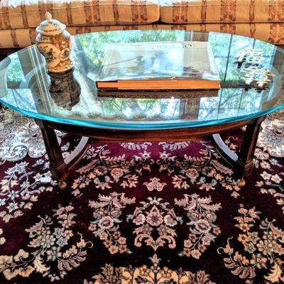 Nice glass top oval coffee table 