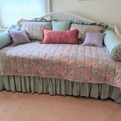 Wicker Trundle bed with mattresses and custom made coverlet, skirt and pillows.  Great for a guest room
