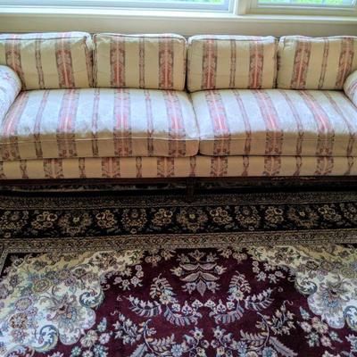 Vintage Henredon sofa with custom uphostery and down cushions.  Sofa has cane back and sides.