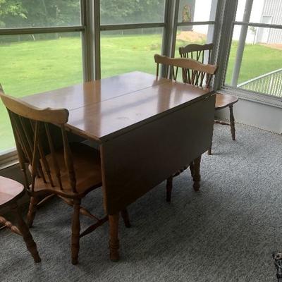 Drop leaf table and 6 chairs 75.00