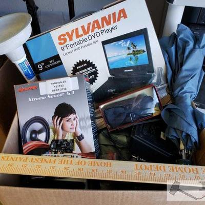 1034	

Diamond Extreme Sound 5.1, Sylvania Portable DVD player, Tape Recorder and More
Also includes Umbrella, Alarm clock, yardstick...