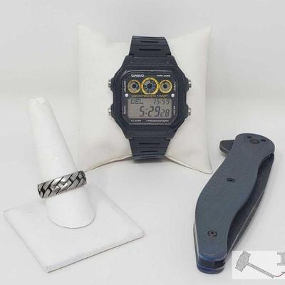 576	

Casio Watch, Ring, and Knife
Casio Watch, Ring, and Knife. Ring Size 10.5