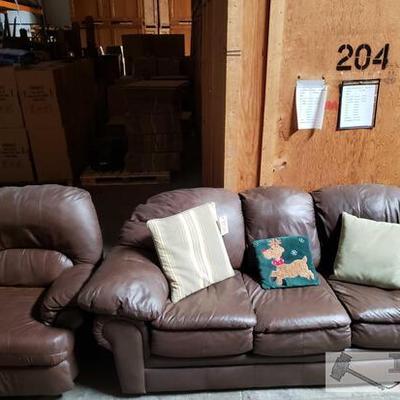 3102	

Leather Couch, Pillows & Matching Recliner
Couch Approximately 86