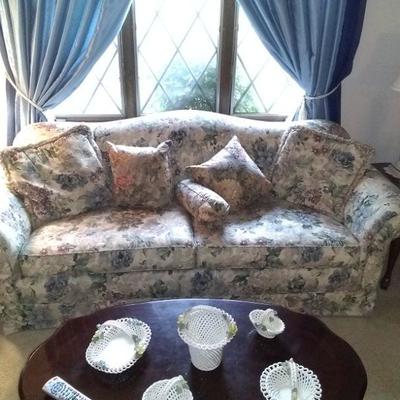 nice floral couch $100.00 coffee table $40.00
