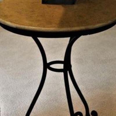 Honey sandstone top set upon an iron base makes this a very attractive table. By Norwalk.  