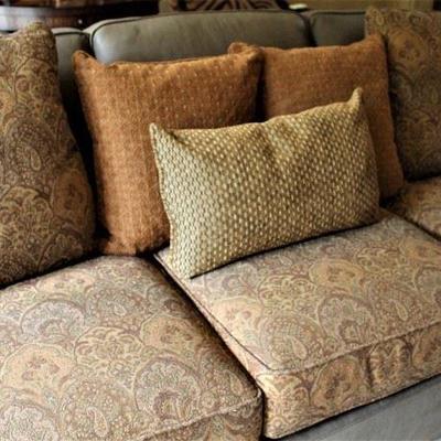 Highly attractive sofa featuring upholstered cushions atop a leather base. A Whittemore-Sherrill sofa by Cook Builders. 
