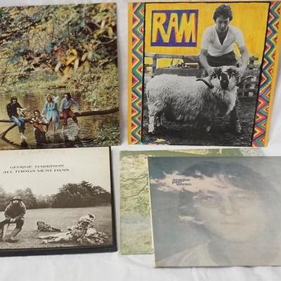 1154	LOT OF FIVE ALBUMS; GEORGE HARRISON ALL THINGS MUST PASS ( 3 LPS, COMES WITH POSTER) JOHN LENNON IMAGINE & JOHN LENNON/ PLASTIC ONO...