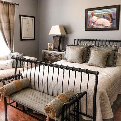 Guest Bedroom View with Metal Fence Rail Bed and Matching Bench