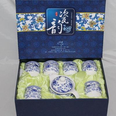 Asian Blue and White Porcelain 8 piece Tea Set: Teapot with Lid and 6 Cups
