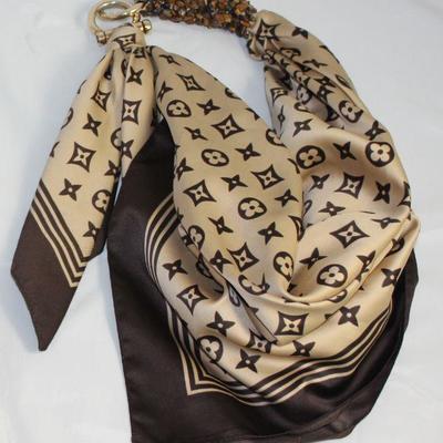 Isles of Capri, Italy Louis Vuitton Motif Design  Scarf Belt with Gold Tone Stirrup Closure and Chipped Tiger Embellishment 
