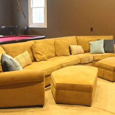 14' when all together.  Take out the center section and you get a 12' sofa and a slipper chair.  Ottomans are storage units.  Domain...