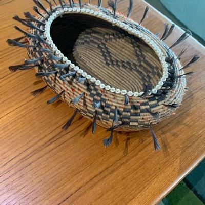 Early Pomo feathered basket circa 1890-1900
Comes with paperwork and receipts. This basket was purchased in March 2000 for $9500....
