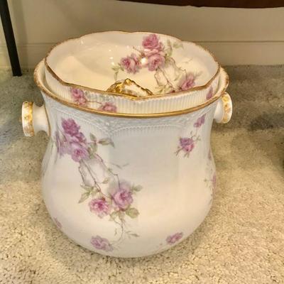 Porcelain chamber pot having floral motif. 

