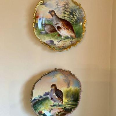 Pair of Austrian large hand-painted porcelain wall plates, each depicting a partridge study. 