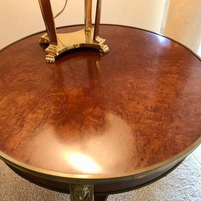 French Empire style circular table with burlwood top. 
W26 3/4