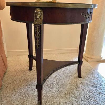French Empire style circular table with burlwood top. 
W26 3/4