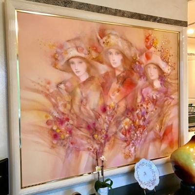 Large oil on canvas depicting the busts of three women in shades of pink. 