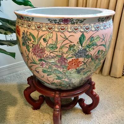 Large Chiness porcelain planter with foliate motif on a carved wood stand.  H19 1/4