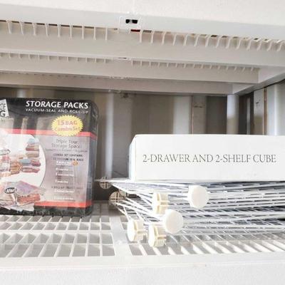 4148	

Vacuum Seal and Roll-up Storage Packs, 2-Drawer and 2-Shelf Cube, and More!
New In Box!