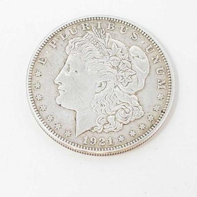 822	

Morgan Silver Dollar- 26.70g
Weighs Approx 26.70g