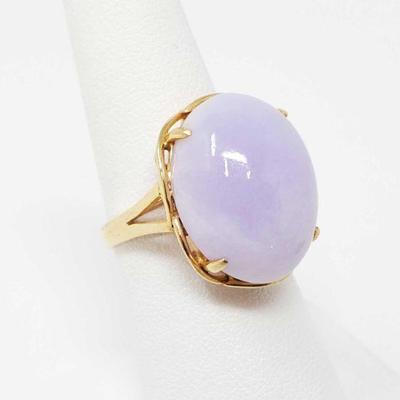 560	
14k Gold Ring With Lavender Semi Precious Stone
Weighs Approx 8.2g Size 7