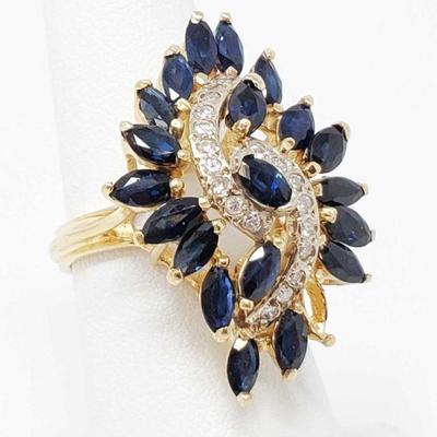 500	

14k Gold Ring With Sapphire And Diamonds, 9g
Weighs Approx 9g Size 7.5
