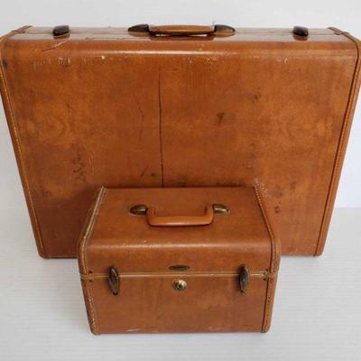 1208	

1 Vintage Leather Samsonite Suit Case, 1 Vintage Leather Samsonite Makeup Box
Measurements Include 9