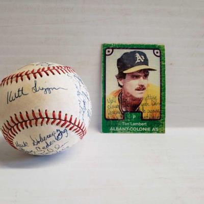 4524	

Autographed Baseball And Autographed Tim Lambert Card
Autographed Baseball And Autographed Tim Lambert Card. Not Authenticated
