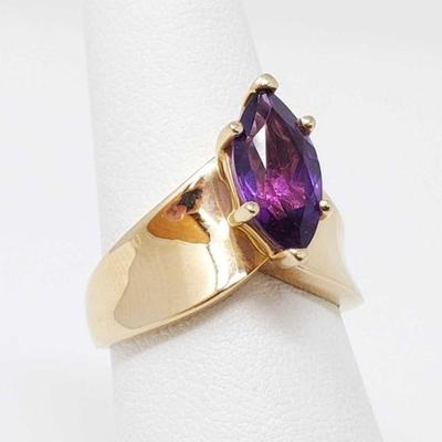 564	

14k Gold Ring With Purple Semi Precious Stone, 6g
Weighs Approx 6g Size 7