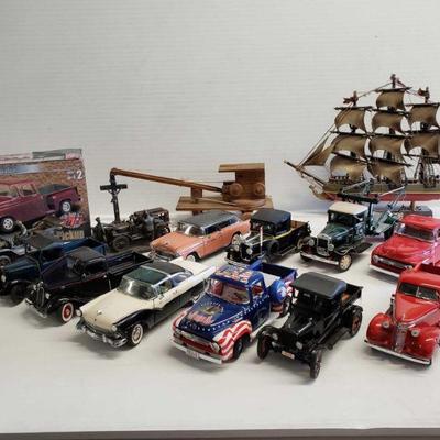 4130	

Approx 11 1:25 Model Cars, Puter Models, Sail Boat, And Crane
Approx 11 1:25 Model Cars, Puter Models, Sail Boat, And Crane