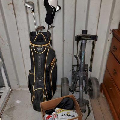 7502	

Top Flite XL Distance Gold Balls, Gold Tees, Golf Headcovers, and More!
Also Includes a Wilson Ultra Caddy, Cherokeee GL-30 Caddy,...
