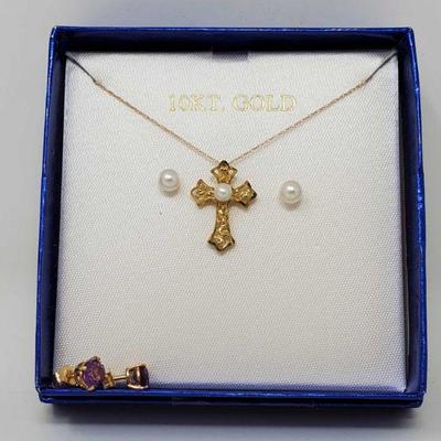 640	

10k Gold Cross Necklace With 10k Gold Earrings
10k Gold Cross Necklace With 10k Gold Earrings
