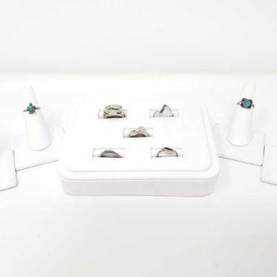 716	

9 Sterling Silver Rings With Turquoise
Weighs Approx 23g Sizes Range 3.5-7