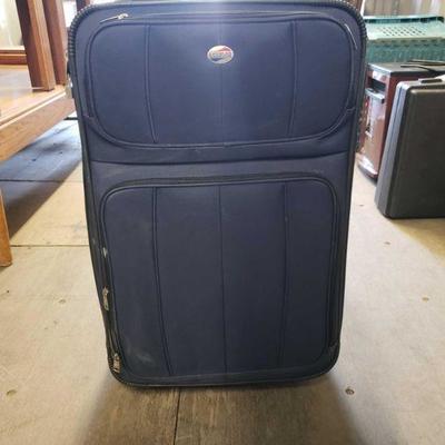 4080	

American Tourist suitcase And More
American Tourist suitcase, Carry On, And Personal Bag Suitcase. 25