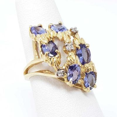 14K gold ring with diamonds and semi precious stones weighs 6.5g and a size 6