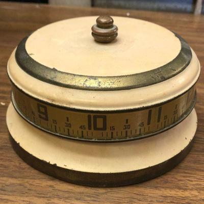 https://www.ebay.com/itm/114362288149	LX2108: Vintage Rotary Tape Measure Clock From the 1930s 40s manual alarm clock ASIS - Not Tested...