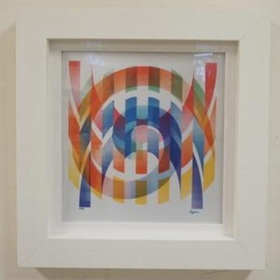 1041	YAACOV AGAM SIGNED ART AAMOGRAPH. 3 DIMESIONAL HOLOGRAM STYLE ART FRAMED. IMAGE SIZE 13 1/4 IN X 14 IN, OVERALL DIMENSIONS 20 IN X...