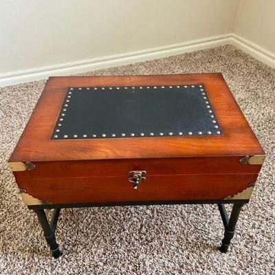 ~ Small operable wooden chest with brass corners atop iron legged base - $45