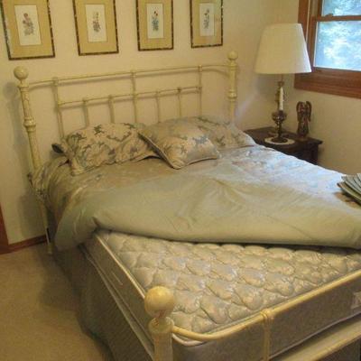Queen size iron bed with crackle paint finish. 
